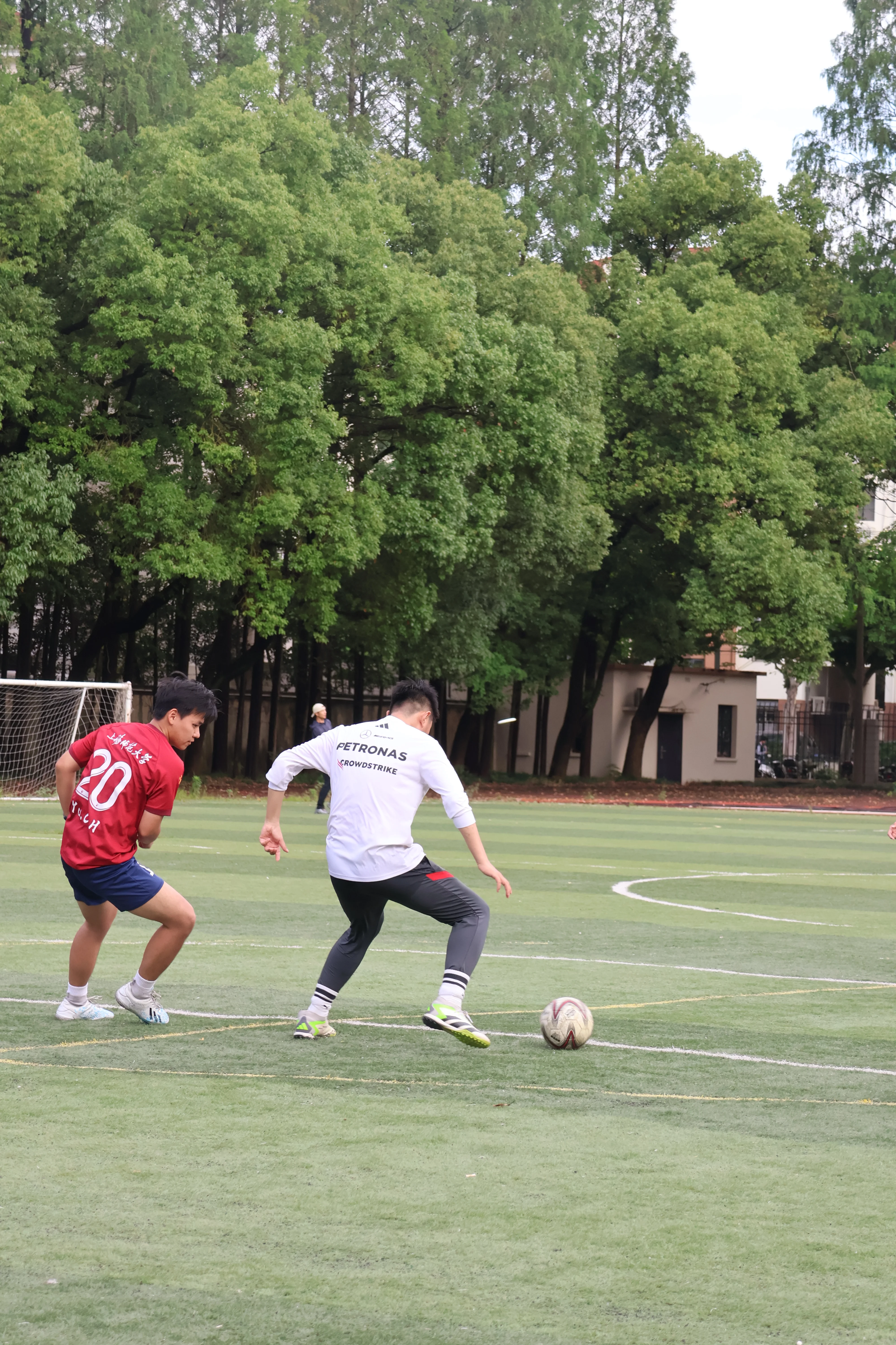 Playing soccer on a green field